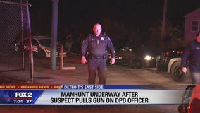 2 arrested after threatening Detroit police with a gun