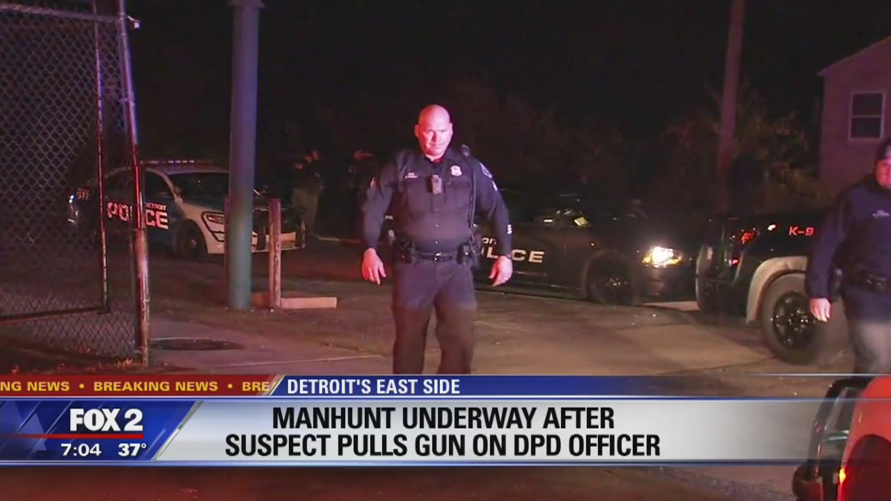 2 arrested after threatening Detroit police with a gun