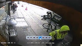 Shocking security video shows suspect pushing man into oncoming traffic