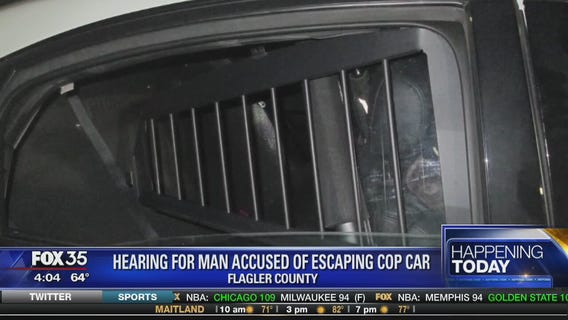 Hearing for man accused of escaping cop car