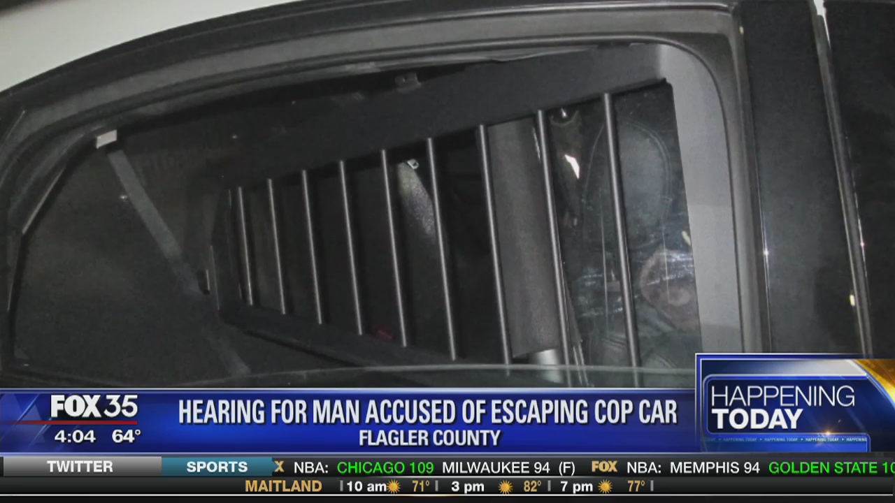 Hearing for man accused of escaping cop car