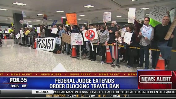 Federal judge extends order blocking travel ban