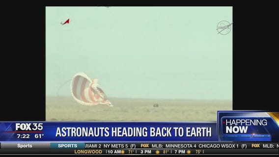 Astronauts land on earth