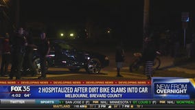 two hospitalized after dirt bike slams into car