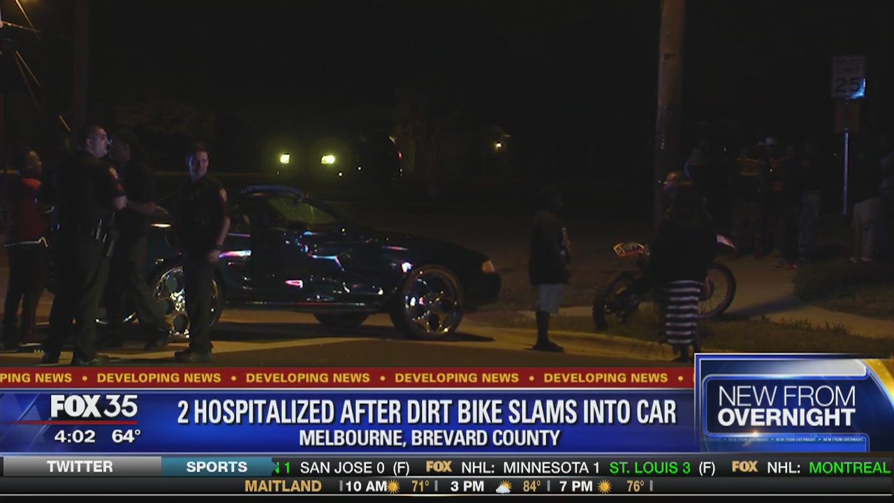 two hospitalized after dirt bike slams into car