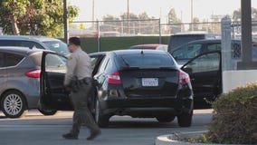 Mother driving with children in car wounded by shotgun in backseat, police say