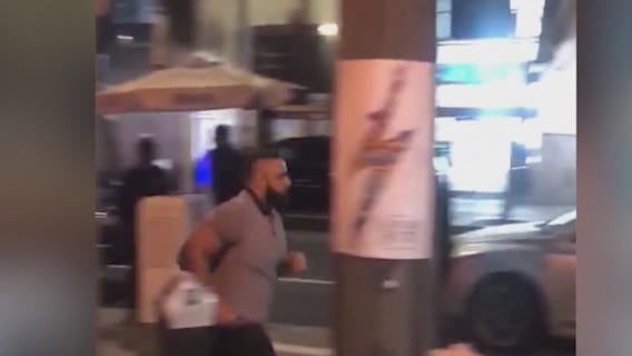 Police arrest man accused of punching women near Los Angeles hot dog stand