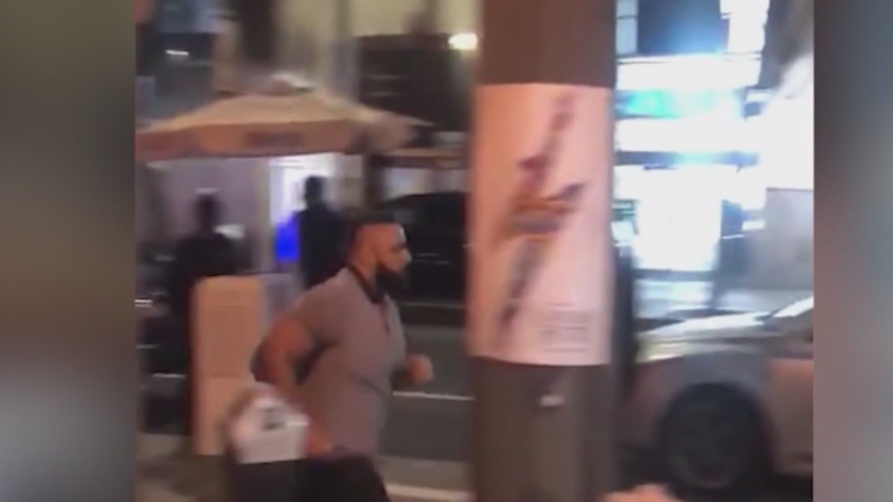 Police arrest man accused of punching women near Los Angeles hot dog stand