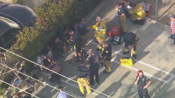 Panga boat with at least 12 on board washes ashore in Huntington Beach