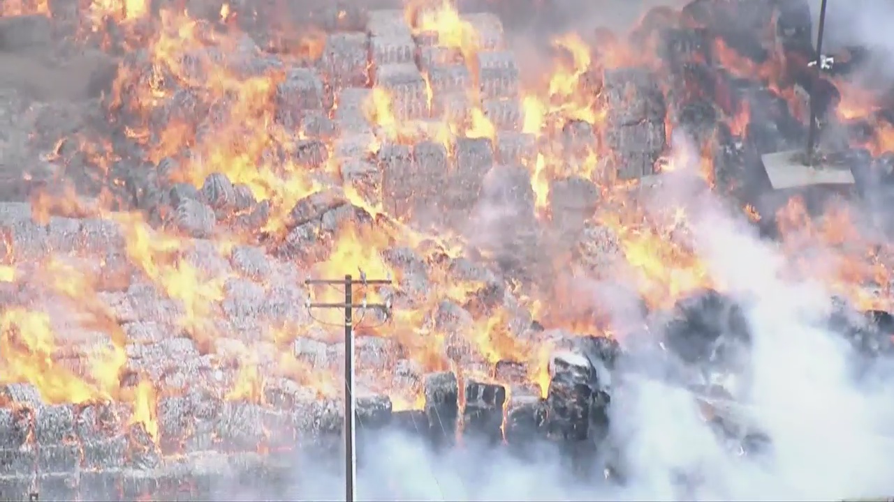 Crews battle large recycling yard fire in Ontario