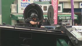 SWAT respond to armed man inside Koreatown store