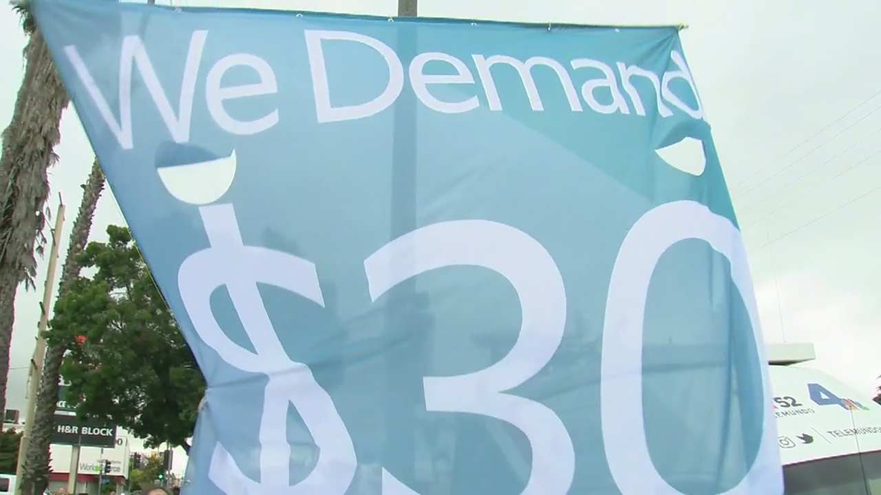 Uber, Lyft workers demand higher wages