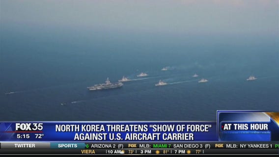 North Korea threatens "show of force" against U.S. aircraft carrier