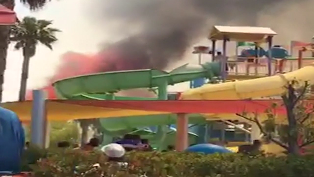 Six Flags Magic Mountain evacuated as fast-moving brush fire burns nearby