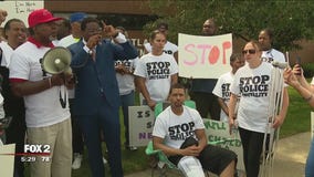 Protesters call for officer's termination after man tasered while holding baby in Westland