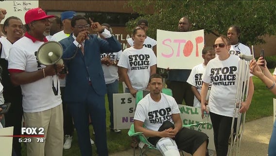 Protesters call for officer's termination after man tasered while holding baby in Westland