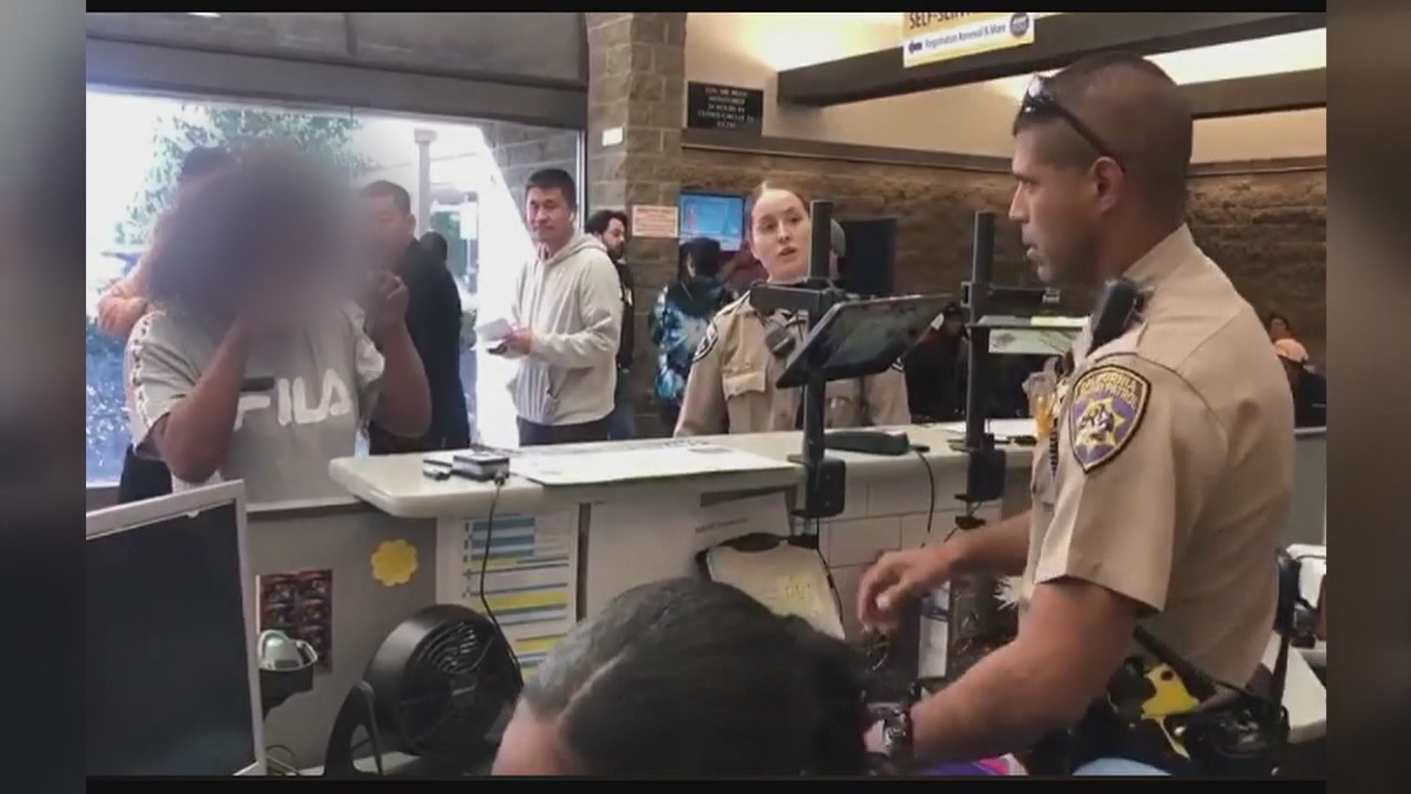 CHP officer uses sign language to help woman at DMV office