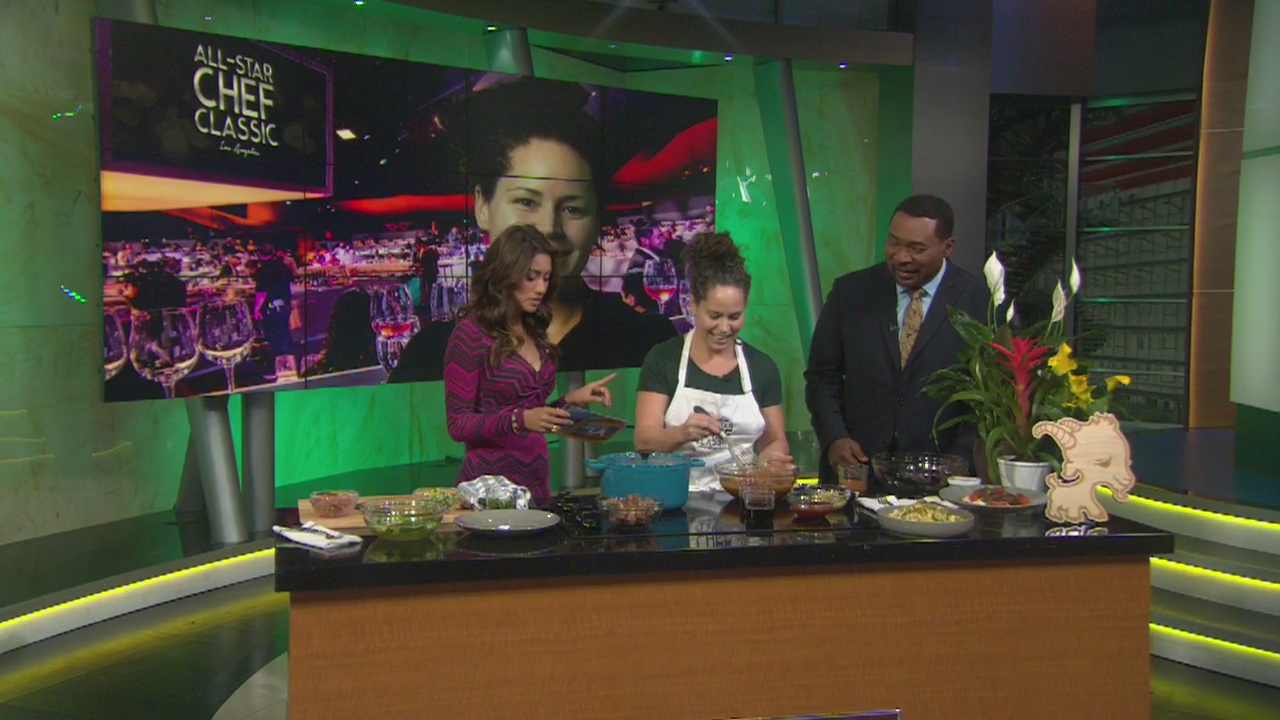 Chef Stephanie Izard demonstrates her cooking skills ahead of the Sixth Annual Lexus All-Star Chef Classic