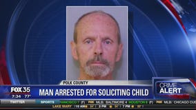 Man arrested for soliciting child