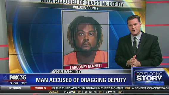 Man accused of dragging deputy