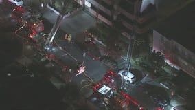 Crews battle fire at Encino apartment