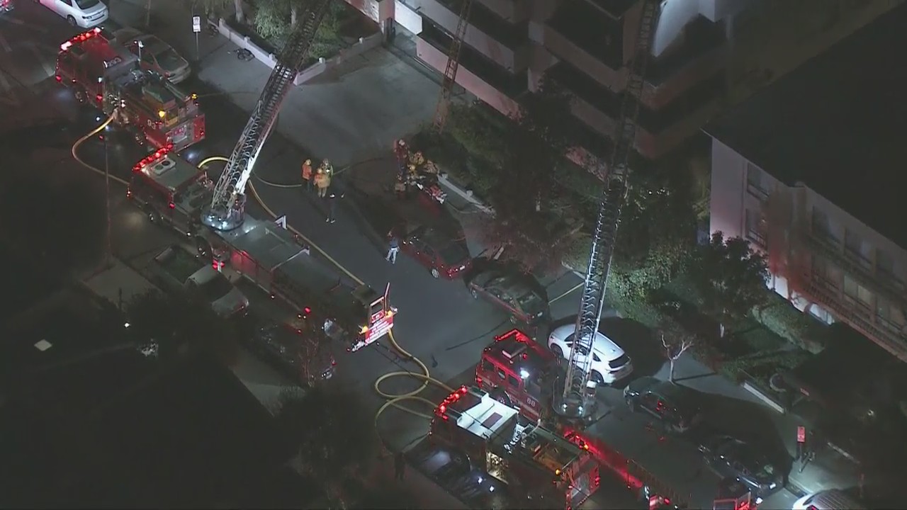 Crews battle fire at Encino apartment
