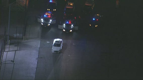 Suspect refuses to leave car after leading officers on chase in downtown Los Angeles
