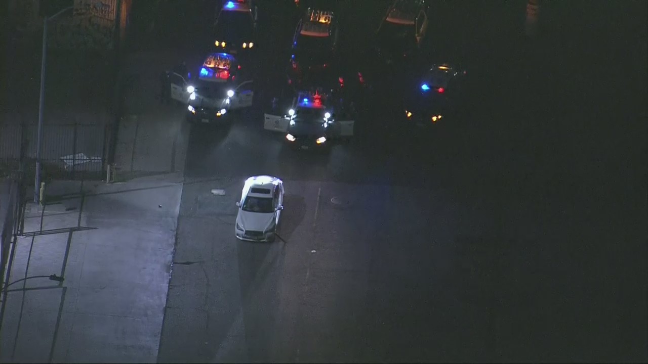 Suspect refuses to leave car after leading officers on chase in downtown Los Angeles
