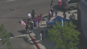 Protesters jump fence at Tinhorn Flats in Burbank