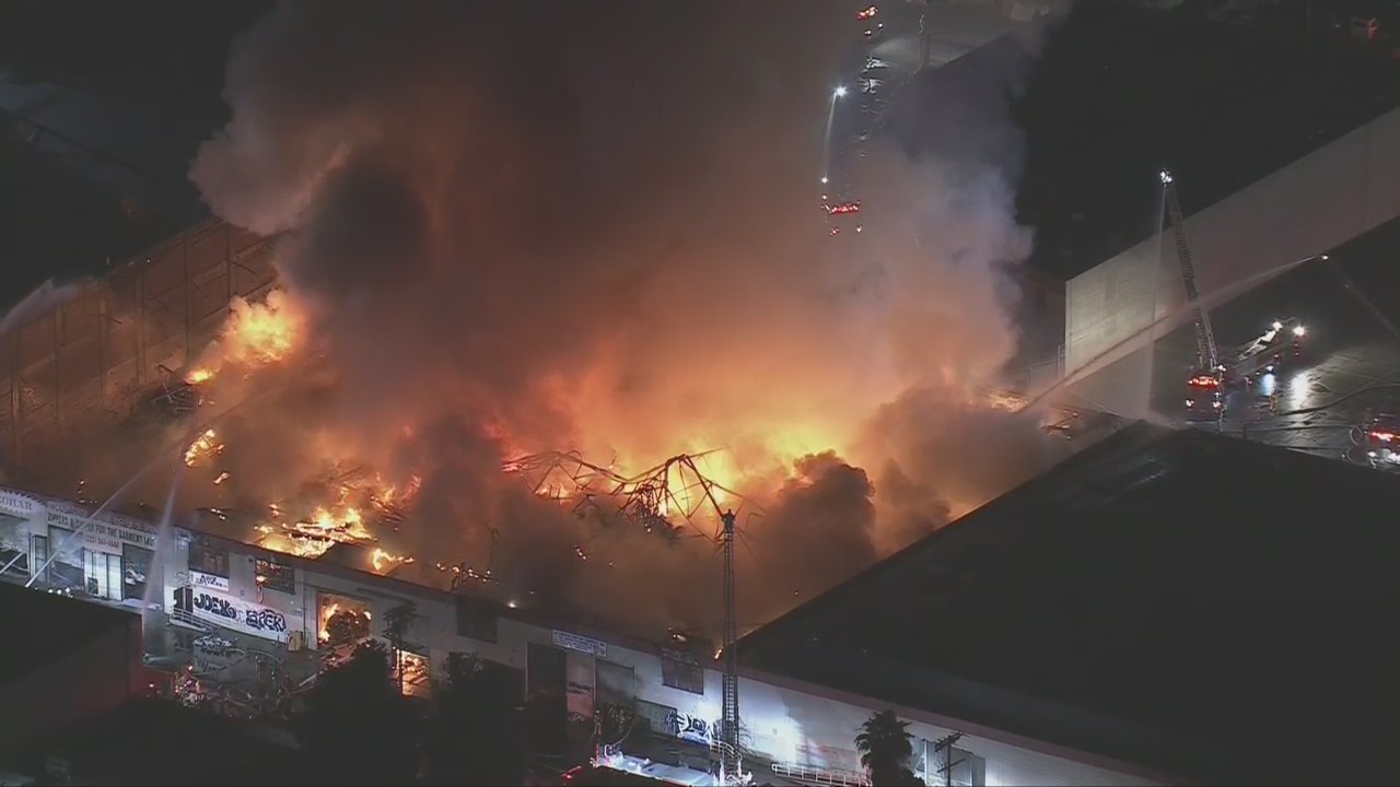 Massive fire causes South LA building's roof to collapse