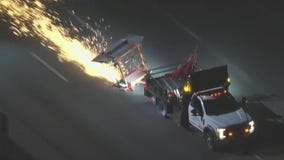 Police Chase: Spark flies behind stolen work truck