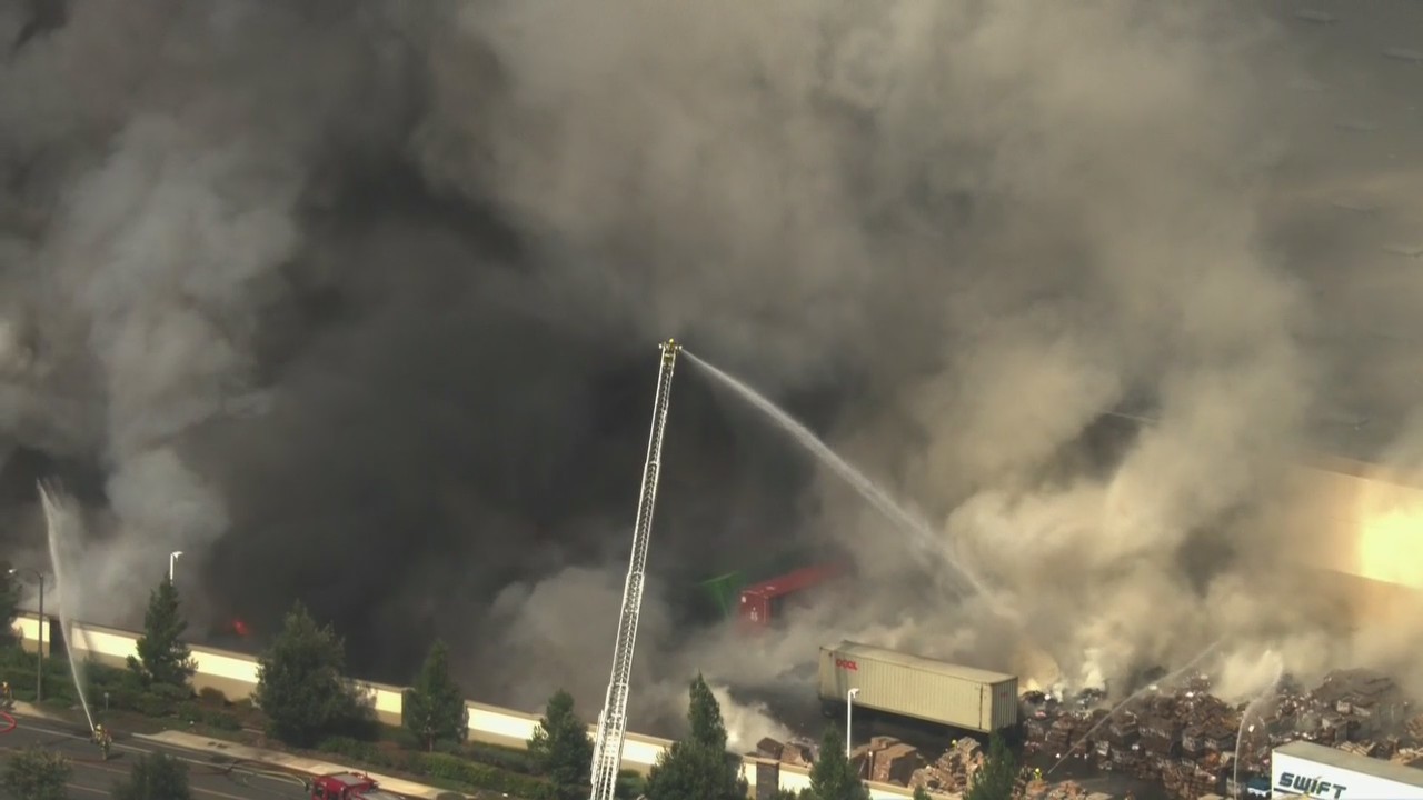 Riverside warehouse engulfed in flames