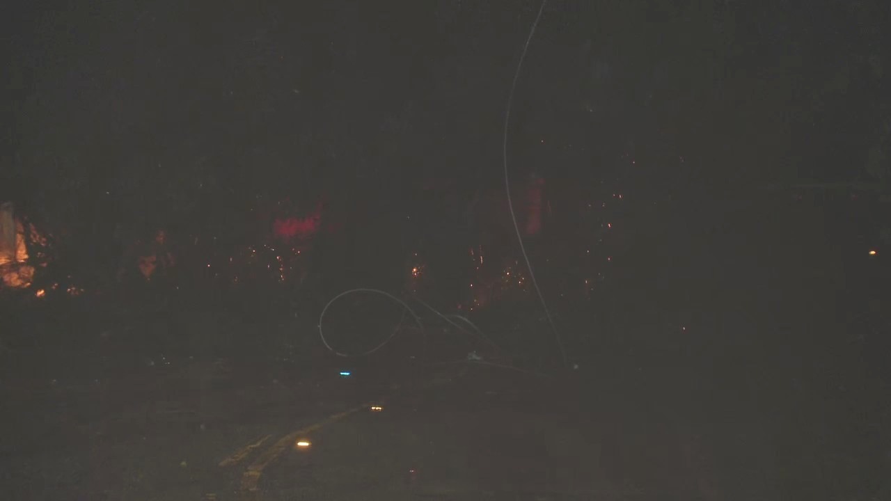 Power line falls on top of car in Hollywood Hills; 1 trapped in car due to live wires