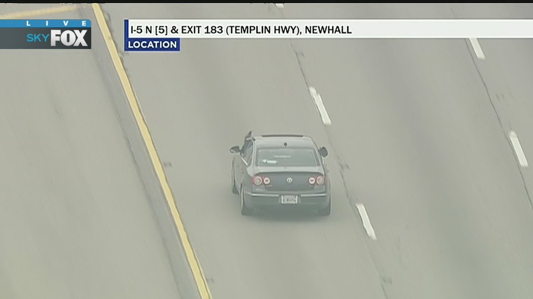 Driver appears to take out phone during LA chase