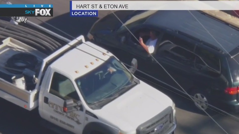 Pursuit suspect makes exchange with driver in Canoga Park