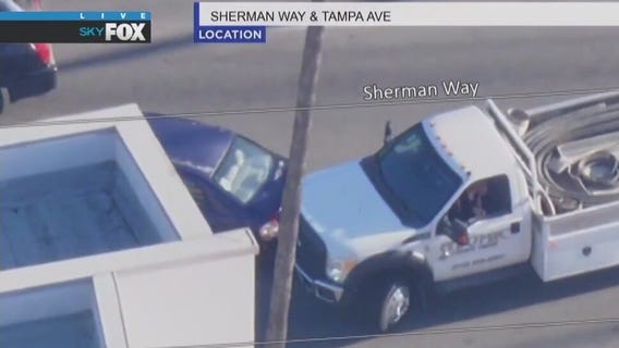 Pursuit driver crashes into sedan