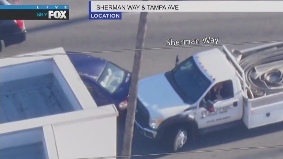 Pursuit driver crashes into sedan