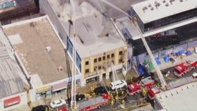 Massive fire erupts in downtown LA