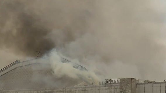 Massive fire tears through WWII-era blimp hangar