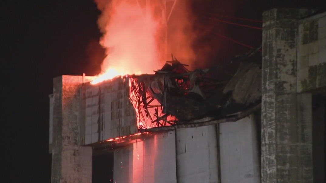 Tustin hangar reignites, cleanup continues