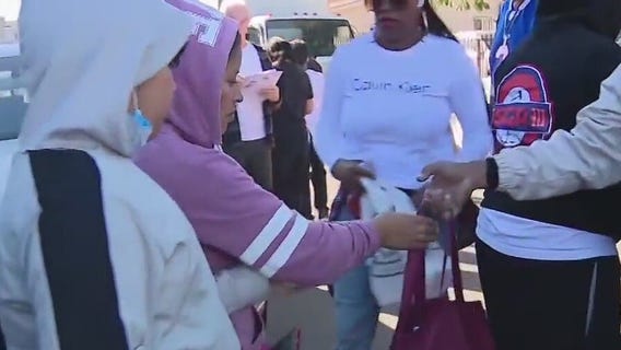 Watts community embraces Thanksgiving turkey giveaway