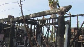 Fire at abandoned house spreads to duplex