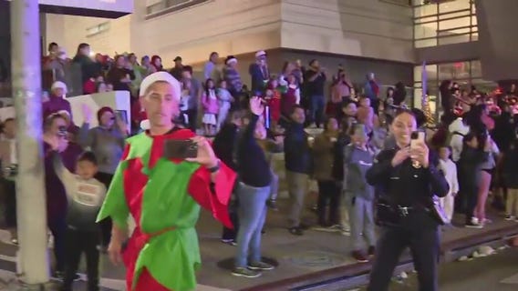 Santa delivers presents to kids in LA