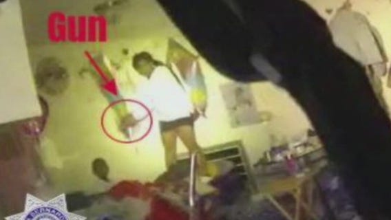 Woman points gun at 3-year-old's head