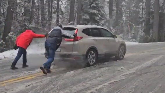 Snow hits mountains, high surf strikes coast