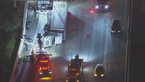 Big rig overturns on 5 Freeway