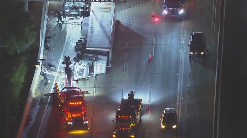 Big rig overturns on 5 Freeway
