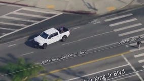 Pedestrian nearly gets hit by car mid-chase