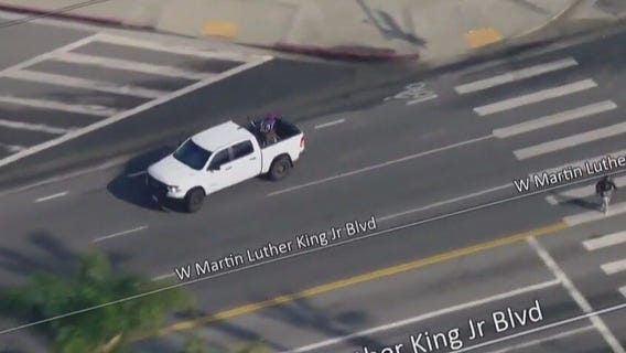 Pedestrian nearly gets hit by car mid-chase