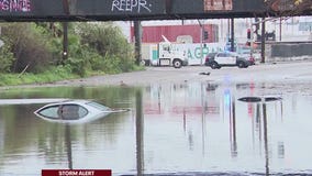 Cars submerged in high floodwaters